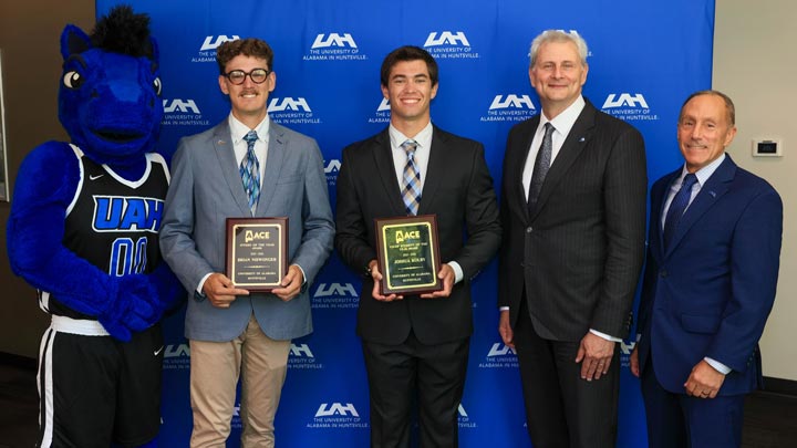 UAH mascot Charger Blue; Brian Niswonger, a senior majoring in kinesiology; Joshua Kolby a 2026 aerospace engineering graduate; UAH President Dr. Don Leo, UAH President; and Dr. Dave Puleo, provost and executive vice president for academic affairs.