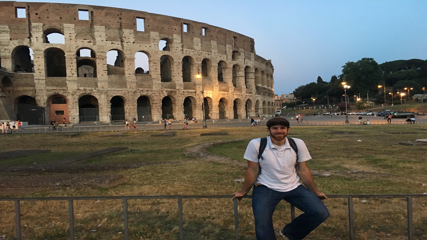 Teacher in front of Roman Colosseum