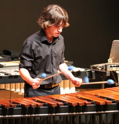 Justin Swearinger playing marimba for a percussion ensemble concert at UAH.