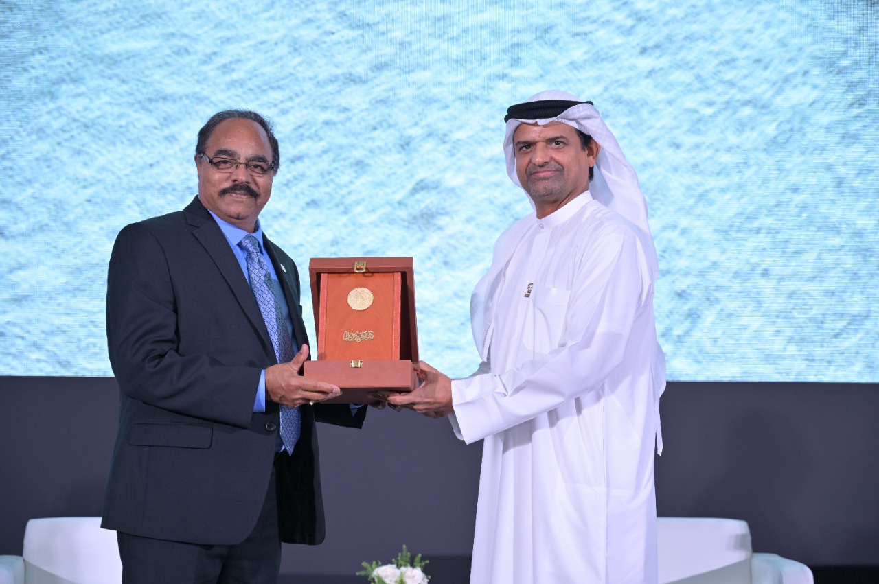 receiving the sheikh zayed tcam award