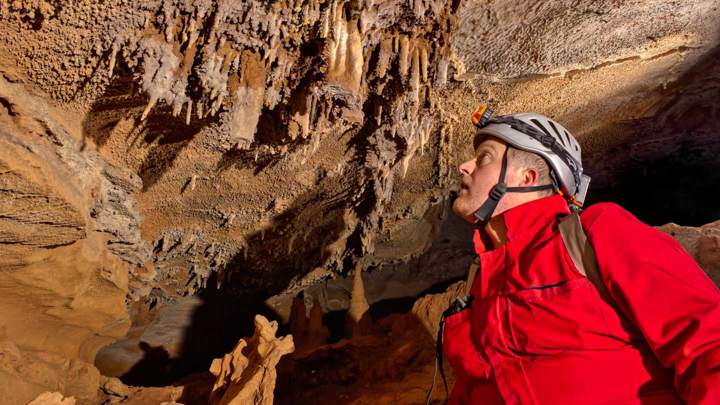 Dr Matthew Niemiller in a cave