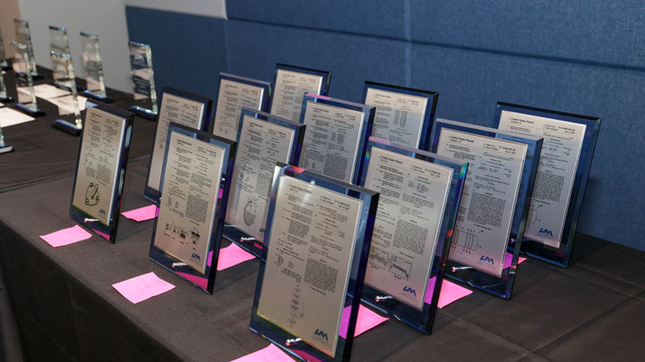 12 desk plaques to 11 inventors from two colleges and four departments at UAH in recognition of patents issued in the past year.