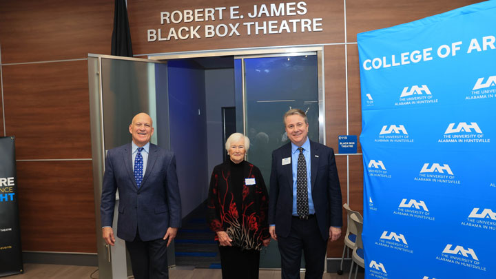 Dr. Charles L. Karr, left, president of The University of Alabama in Huntsville (UAH), walks out of the newly dedicated Robert E. James Black Box Theatre with James’ cousin Dr. Carolyn Schroeder, center, and Dr. Sean Lane, dean of the UAH College of Arts, Humanities and Social Sciences