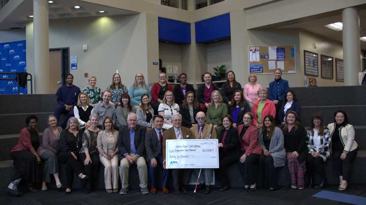 Faculty and staff in the College of Nursing at The University of Alabama in Huntsville (UAH) celebrate the new James Raper and Scott Holtham Compassionate Care Endowment on March 2, 2026, in the Nursing Building on campus.