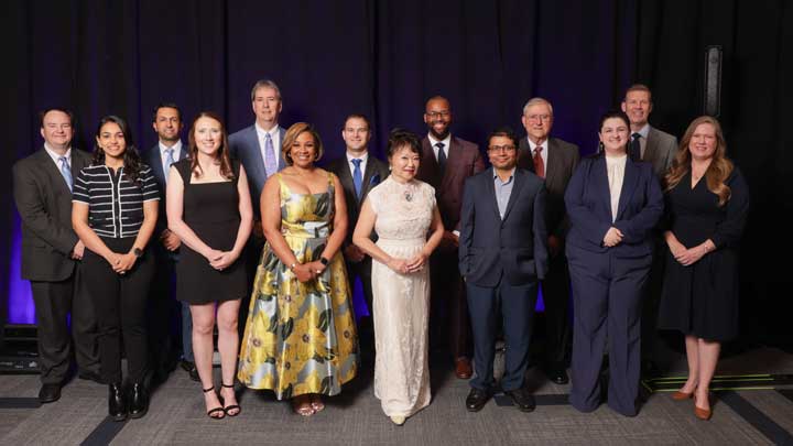 Recipients of the awards, which honor outstanding alumni, partners and supporters, are, front row left to right, Anvi Dalal, Caroline McAnally, Michelda Johnson, Kathy Chan, Prabodh Satyal, Lauren Bowers and Shannon Collins Shaver, and, back row left to right, Shane Davis, Amir Deylami, Brad Hill, Taylor Reed, Matthew Gardner, Gerald Smith and Jeff Samz