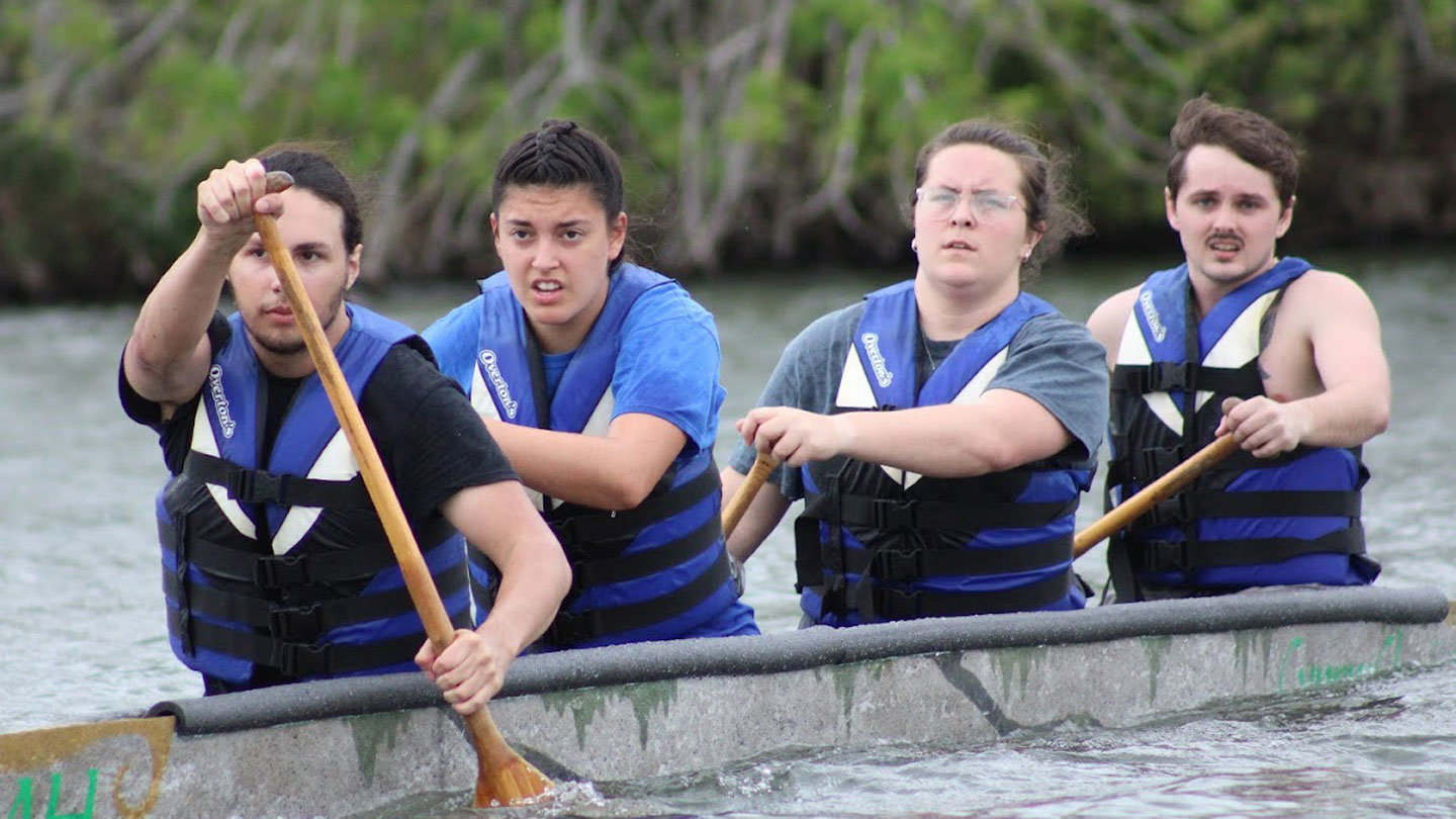 UAH engineering students racing a concrete canoe on the Bayou St. John in the 37th annual American Society of Civil Engineers.