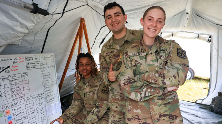 Army ROTC Cadets Mia Perry, Daniel Navarro and Sarah Carter, left to right, manage the facts and figures of the unit’s field training exercises on Redstone Arsenal