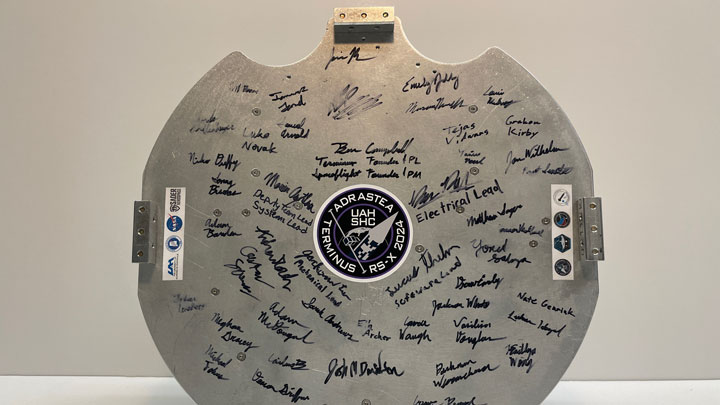TERMINUS team members added their signatures to the base of the payload assembly