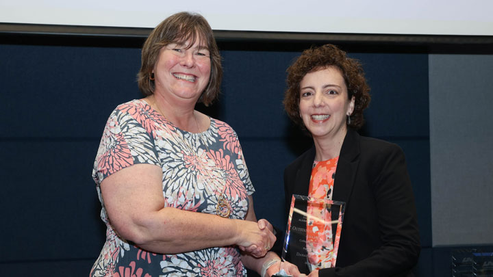 Dean Beth Quick, College of Education, presents Outstanding Faculty Award to Dr. Dana Skelley