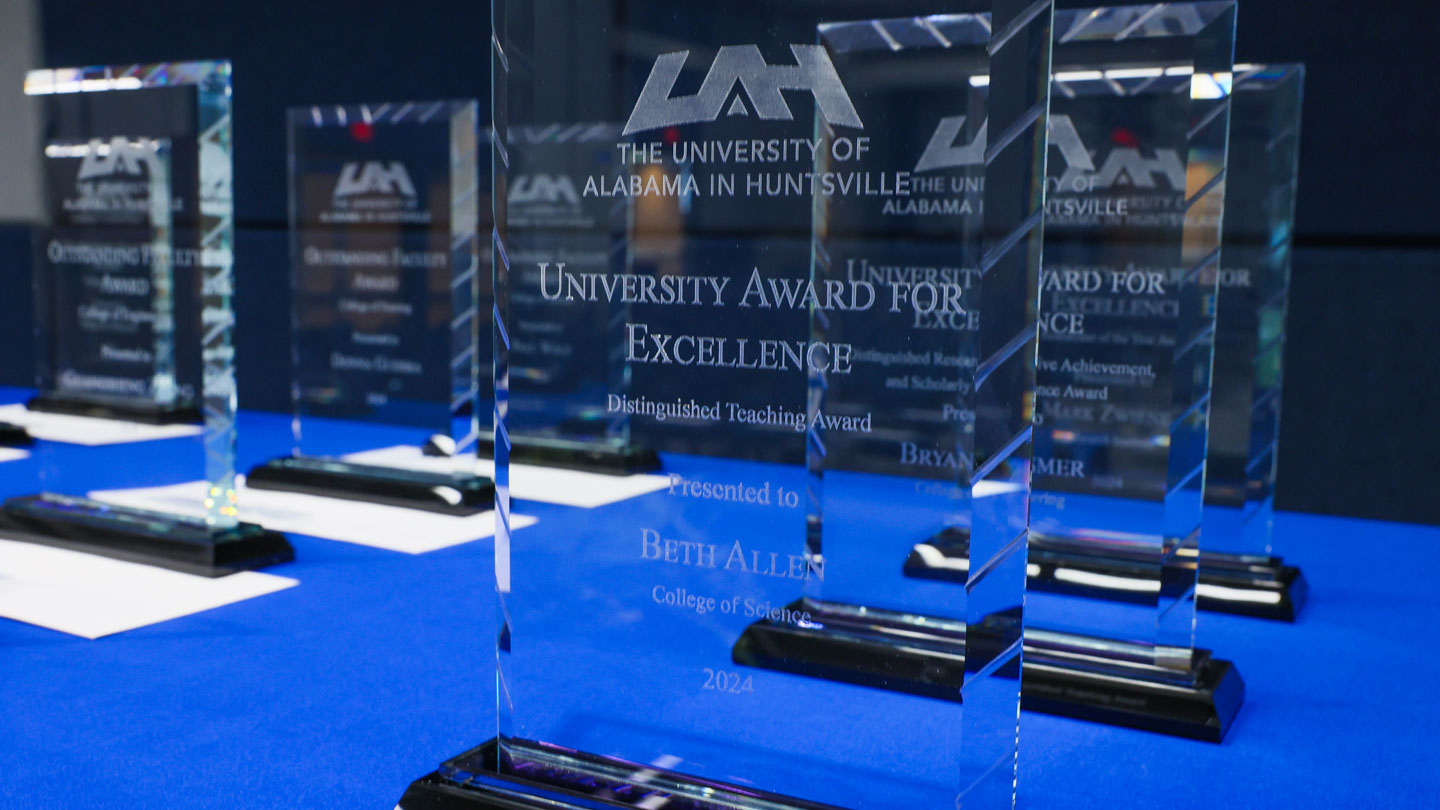 UAH presenting plaques to 15 faculty and staff members and researchers during the 2024 University Awards for Excellence ceremony.